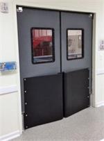 Ruff Tuff Doors- Traffic Doors with tear drop bumpers for pallet traffic..