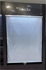 Roll down night covers for sale for refrigerated deli cases in grocery stores.